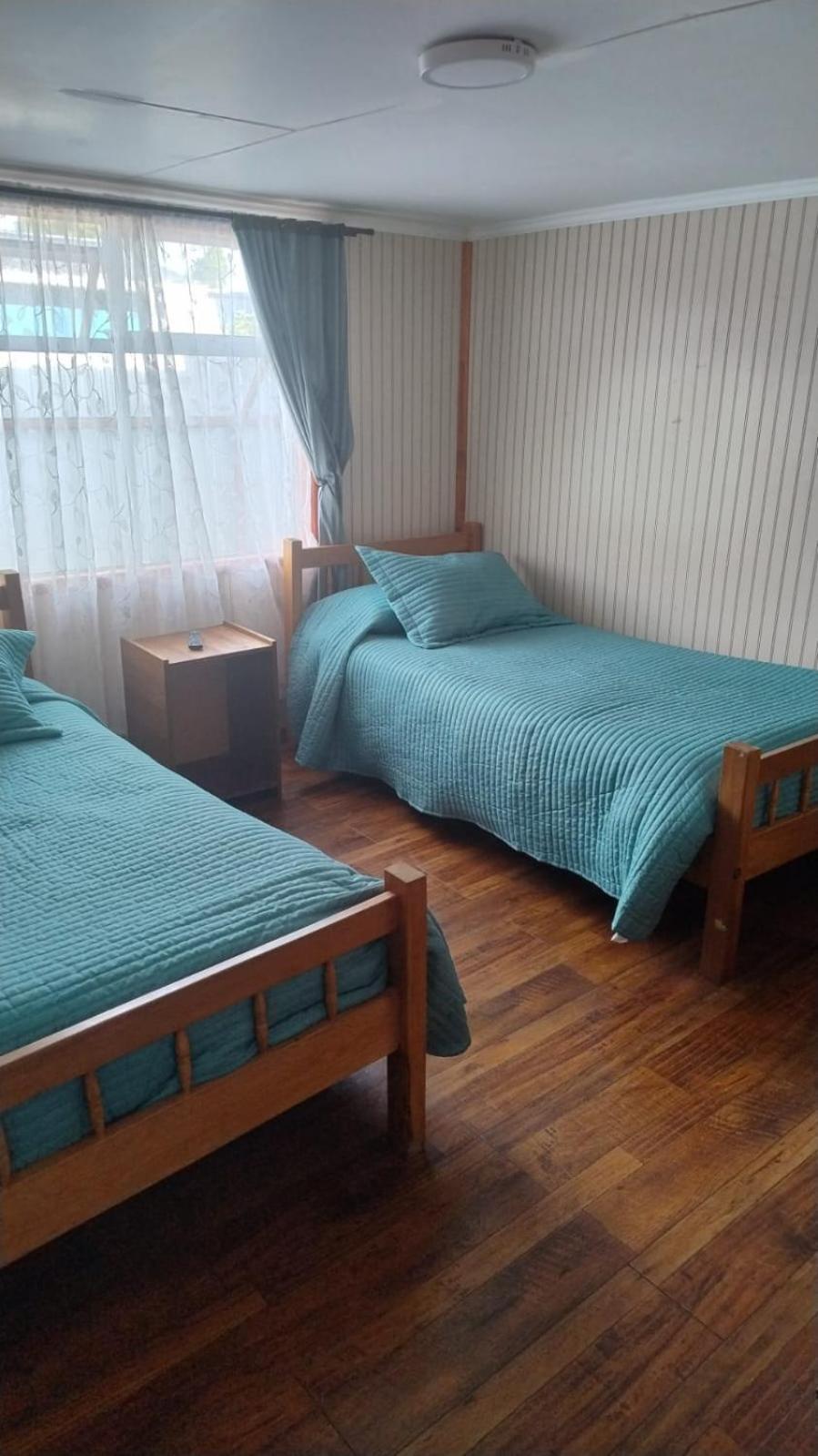 Hostal Y Residencial El Mundial Пуерто Наталес Екстериор снимка